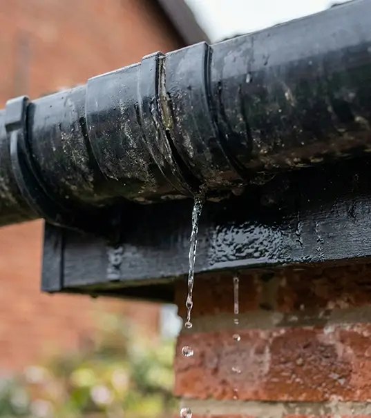 Leaking gutter joint needing repair